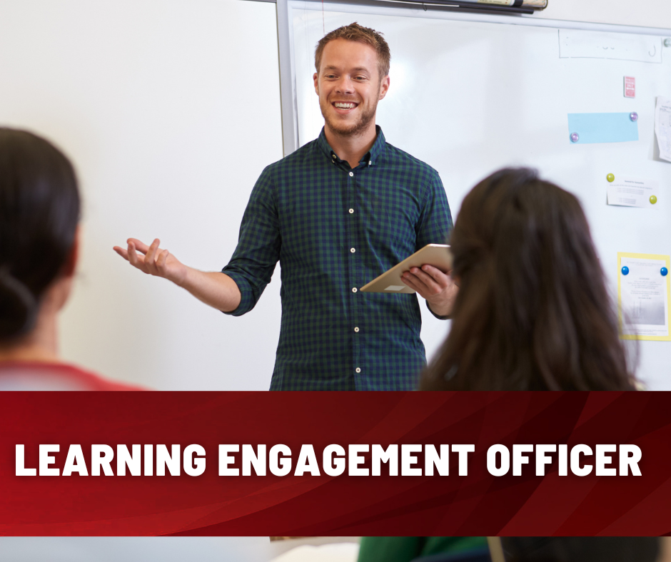 Man with clipboard talking to people.