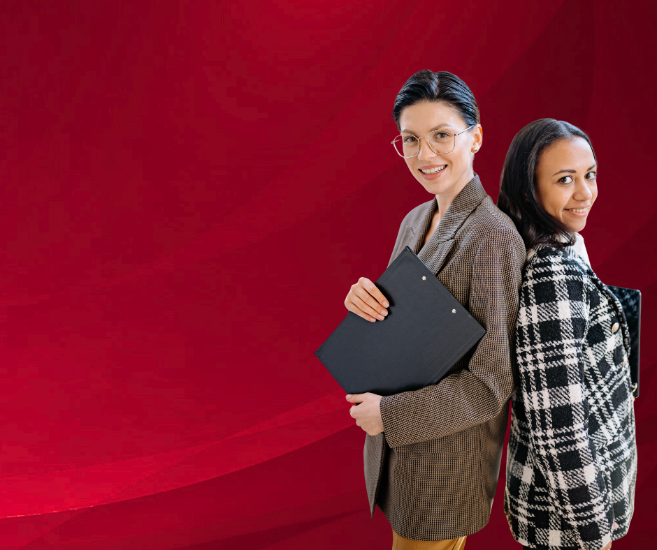 two girls standing back to back 