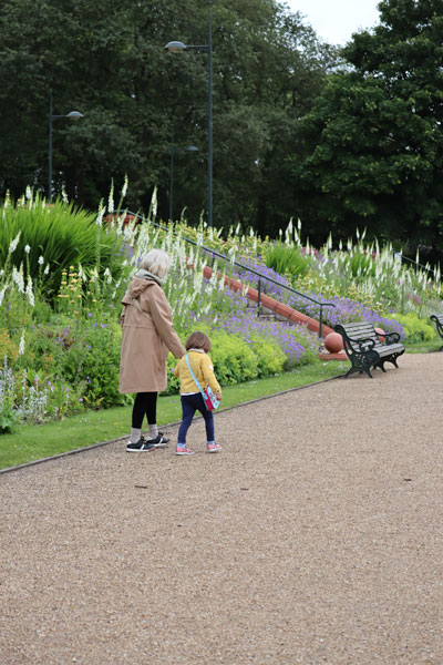 Grandmother and granddaughter walking in Hanley Park