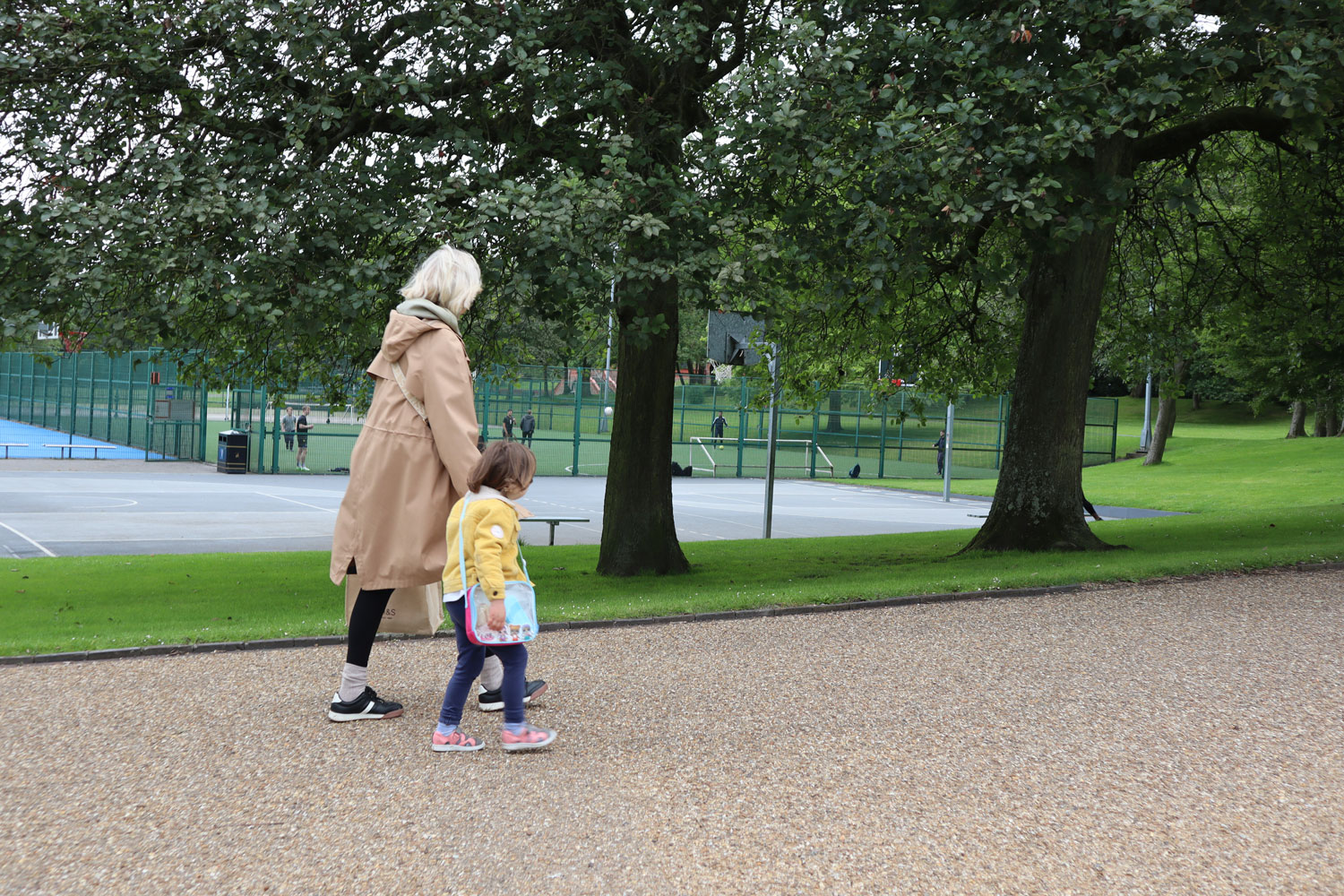 Grandmother and granddaughter walking in Hanley Park